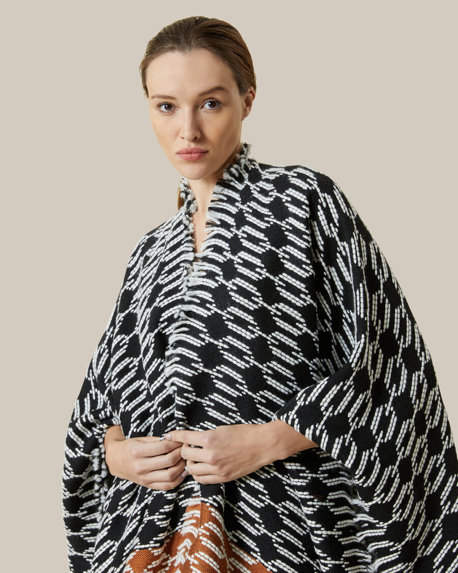 poncho mit fransenmuster