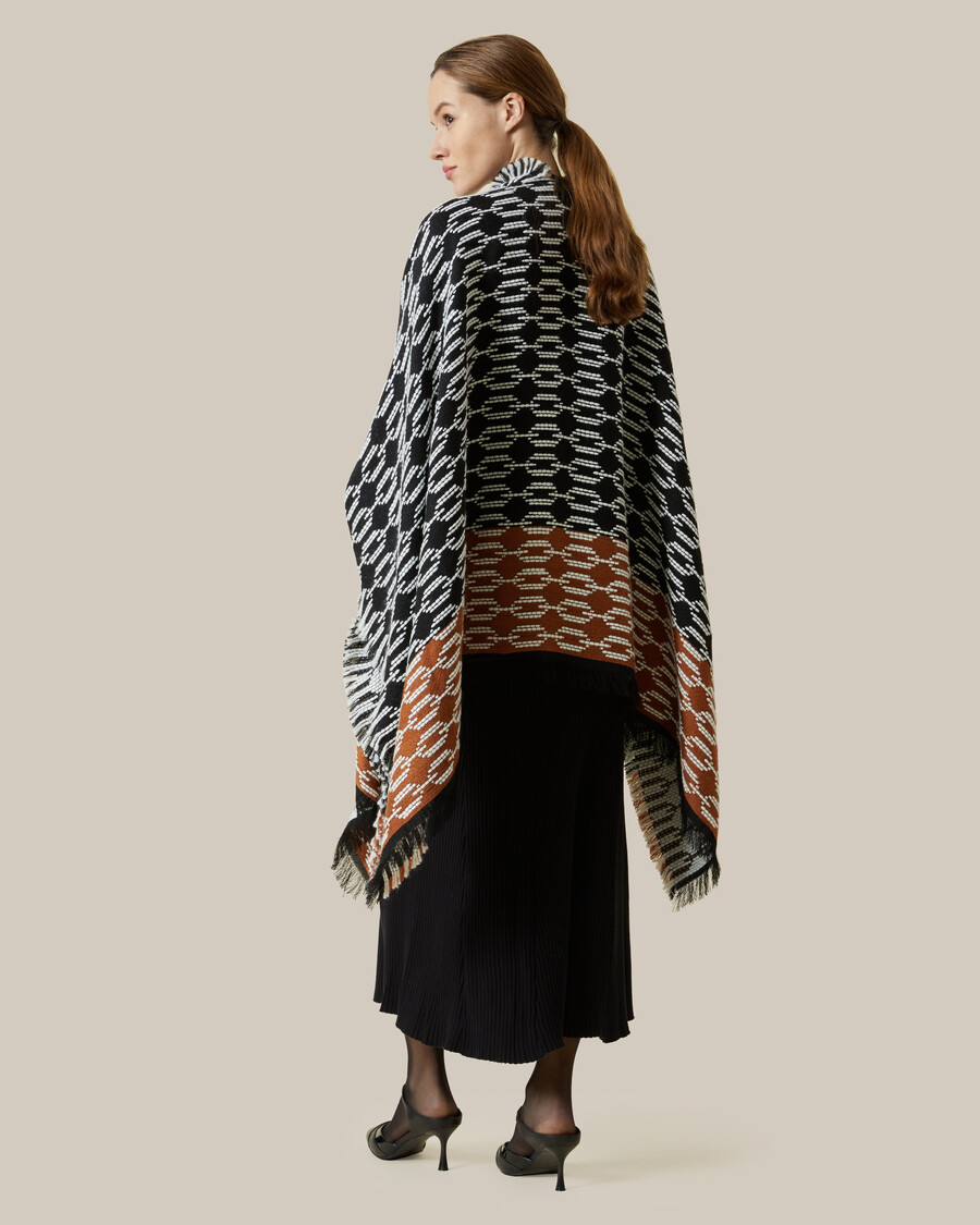 poncho mit fransenmuster